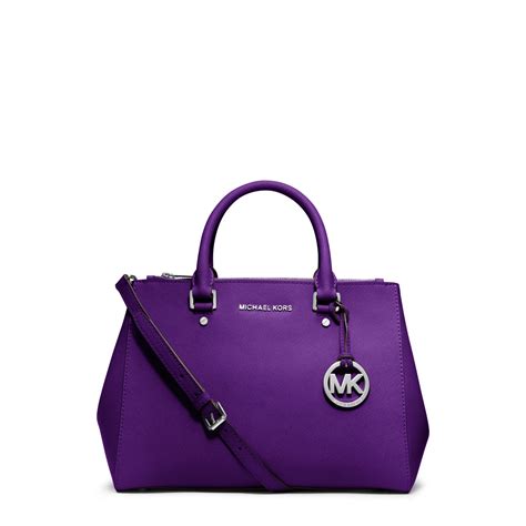 michael kors purple clutch bag|More.